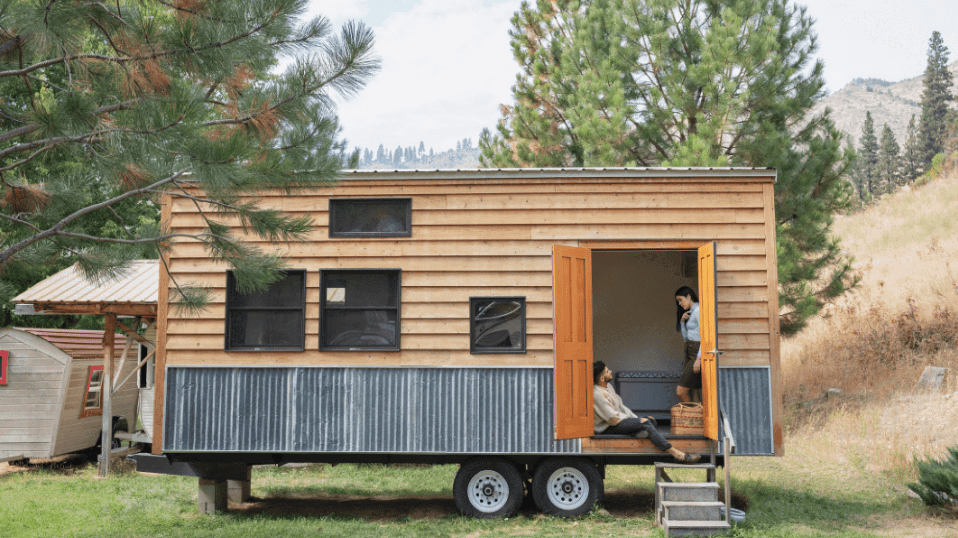 two people inside a tiny home